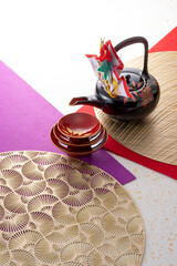お屠蘇と和風の敷物のイメージ