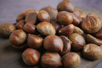 Fresh chestnuts ready for cooking and eating in kitchen