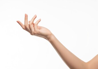 Slender female arm and hand reaching up in a graceful gesture isolated on a clean white studio background.