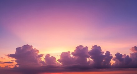 Vibrant Sunset Sky with Cloud Formations Over Water.