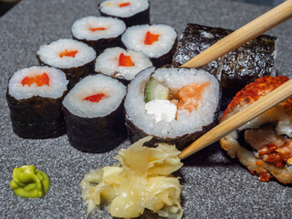 Sushi Varieties Featuring Paprika Hosomaki and Futomaki