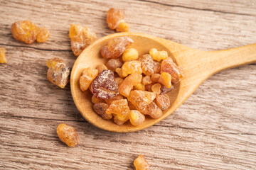 Frankincense or olibanum aromatic resin isolated on white background used in incense and perfumes.