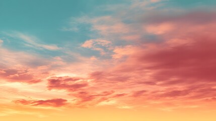 Fototapeta premium Beautiful colorful sunset sky with vibrant pink orange and blue hues and scattered clouds over a calm horizon du evening time