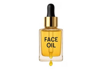 Face oil serum dropping from dropper bottle