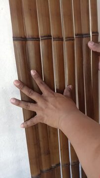 Handcrafted Bamboo Window or Lattice Manufacturing and Installation Process with Protective Varnish