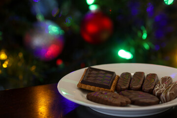 Chocolate Christmas Cookies with Festive Blurred Tree Lights