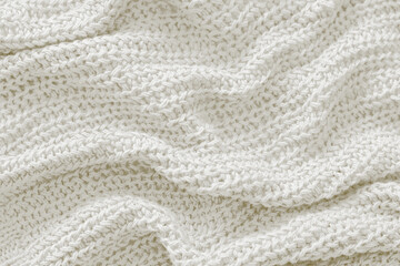 Cloud dancer toned colour monochrome texture knitted fabric. Knitted Jersey as textile background. Monochrome color background. Wool knitting texture. Trendy color 2026.