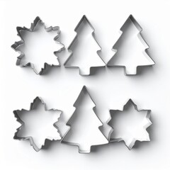 Christmas Cookie Cutters Arranged on White Surface Overhead Still Life
