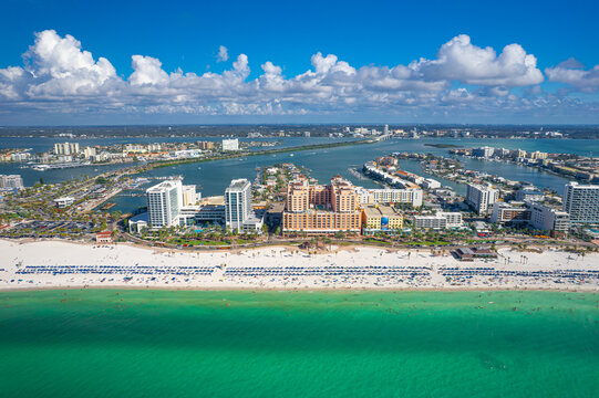Panorama of city Clearwater Beach FL. Spring, winter or summer vacations in Florida. Beautiful View on Hotels and Resorts on Island. Blue-Turquoise of Ocean water. Gulf of Mexico or America. Sunny day