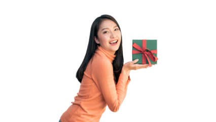 Happy Asian woman holding red shopping bags and gift box for Christmas and New Year holiday shopping.