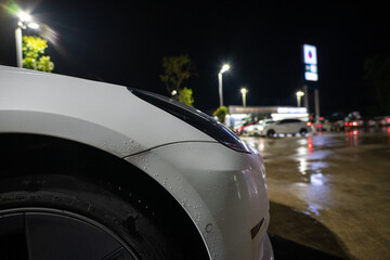 Car parking at night EV station parking lot