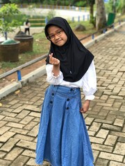 Portrait of a Hijabi Girl Wearing Glasses and Posing Naturally