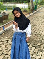 Portrait of a Hijabi Girl Wearing Glasses and Posing Naturally