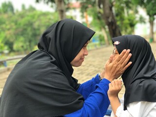 A Tender Moment of Mother and Child Smiling Closely Together