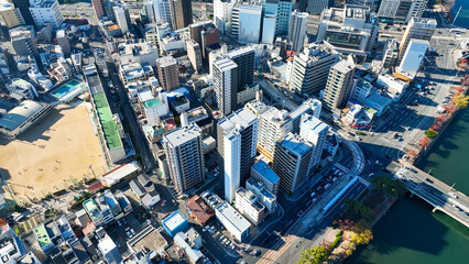 Fototapeta premium Aerial view of modern cityscape taken by drone