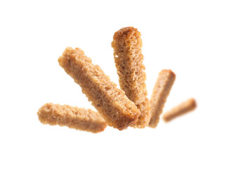 Bread croutons levitate on a white background