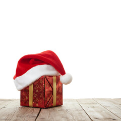 Red Christmas Gift with Santa Hat on White Background