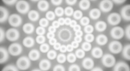 Monochrome Concentric Rings Background: Blurred White Glow Effect and Symmetric Circular Pattern for Abstract Design Backdrop