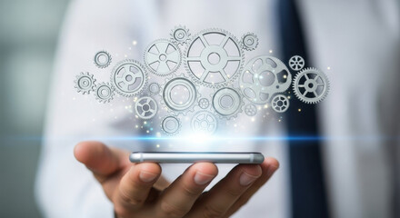 Close up shot of a person holding a phone with gears illustration above their palm, softly focused and rendered in metallic colors. Business technology concept.