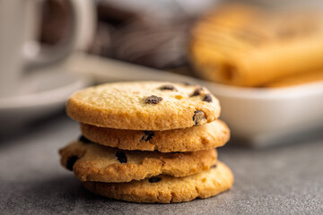Sweet chocolate cookies on kitchen table.