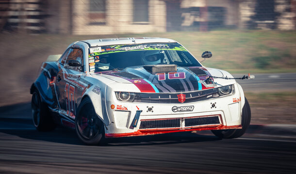 Latvia, Riga 03-05.10.2025. FIA Drifting cup High-speed drift car performing on a race track with vibrant decals and racing modifications