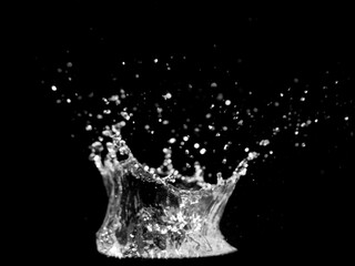 A stunning grayscale capture of water splash forming crown