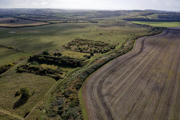 Bokerley Dyke 5.75km prehistoric linear earthwork snakes across edge of Martin Down near east end of Dorset Cursus. Bronze or Early Iron Age boundary