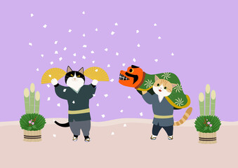 獅子舞と紙吹雪で新年を祝う2匹の猫

