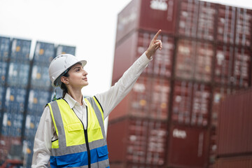 Portrait finger point Caucasian woman logistics workers at container site	
