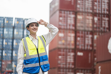 Portrait Caucasian woman logistics workers at container site	