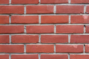 Background from a wall made of clean red bricks