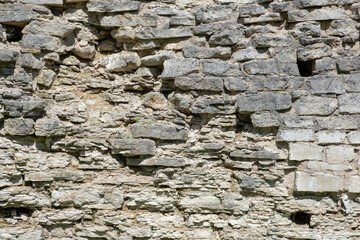 Weathered Stone Wall with Uneven Rocks