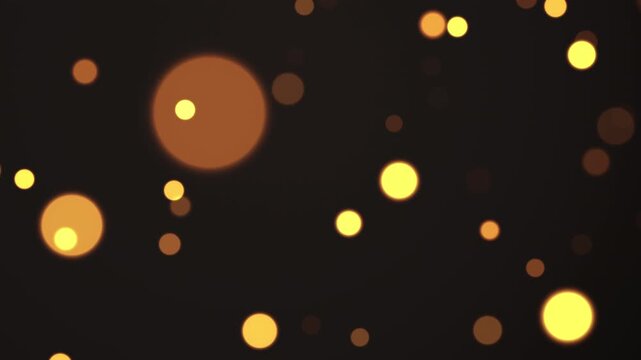 オレンジに光る玉ボケ　スロー回転　ループ