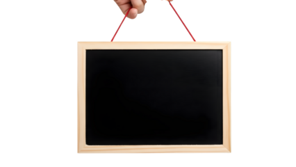 Hand holding a blank wooden framed chalkboard against a stark black background