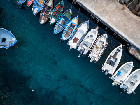 Catania, Italy &ndash; 05 December 2025: Aerial top view of small boats docked along the pier in the San Giovanni Li Cuti harbor. Editorial use only.