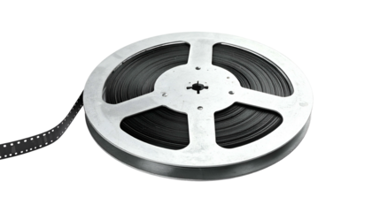 Close-up of a vintage film reel, with strips of film extending from the reel