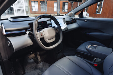 Modern electric vehicle interior showcases stylish design and advanced features