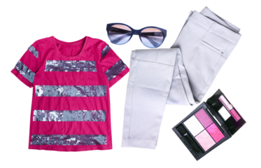 stylish flat lay photograph displaying a modern women's outfit with sparkling accents and coordinating makeup.