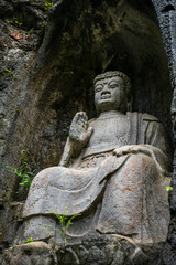 Hangzhou, China, Buddha sculpted inside a rock, fei lai feng