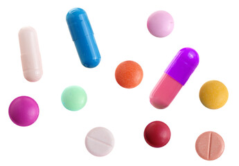 assortment of colorful pharmaceutical pills and capsules scattered on a dark background, illustrating various medications.