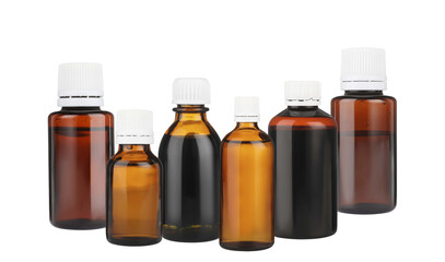 collection of amber glass medicine bottles with white caps, showcasing different sizes for pharmaceutical packaging.