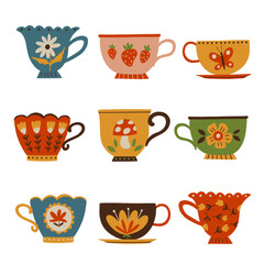 Vector set of vintage tea cups with folk art motifs, flowers, berries, butterflies and mushrooms. Colorful retro kitchenware illustration ideal for decor, stickers, cards, crafts, home design projects