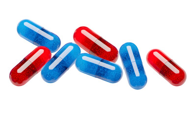 red and blue transparent capsules containing granular substances, scattered on a dark transparent background, representing choices.