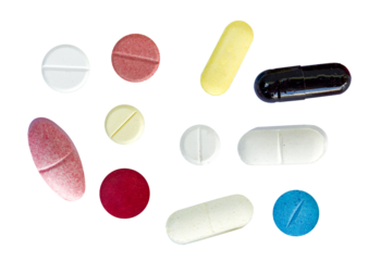 a diverse array of multicolored pills, tablets, and capsules scattered on a stark transparent background, symbolizing medication variety.