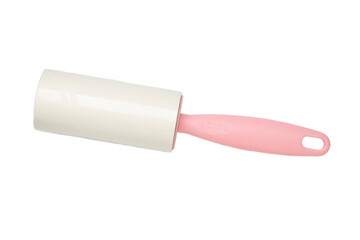 Cloth fabrics cleaner lint roller brush with paper roll isolated on white background. Sticky roller, pet cat dog fur dust hair remover