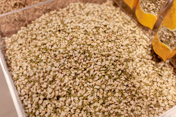 Close-up of dried jasmine buds tea piled in supermarket, Sanya, Hainan, China. Chinese everyday local food culture and authentic tea ingredients 