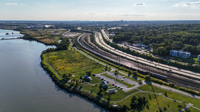 Aerial view of Interstate 495 highway, Northeast Corridor railroad, Fox Point State Park next to Delaware River near Wilmington, Delaware 