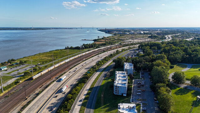 Aerial view of Interstate 495 highway, Northeast Corridor railroad, Fox Point State Park next to Delaware River near Wilmington, Delaware 