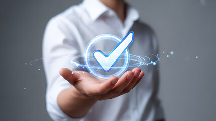  Futuristic digital checkmark floating above hand symbolizing approval, success, and verification