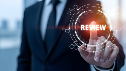 Businessman touches the review button on a digital interface
